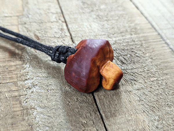 hand-carved avocado stone mushroom necklace