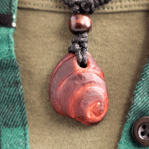 hand-carved avocado stone with spiral