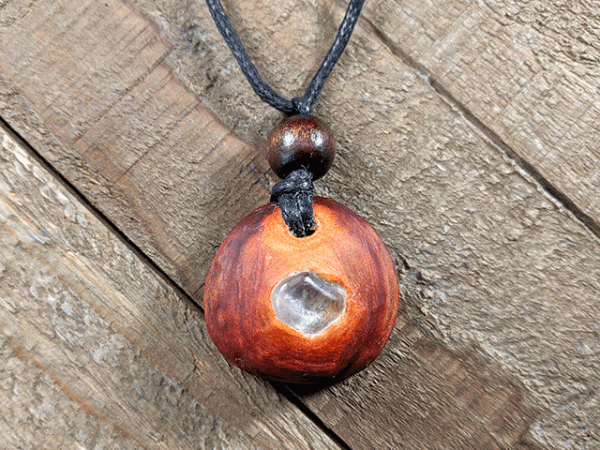 Hand-carved avocado necklace with clear quartz