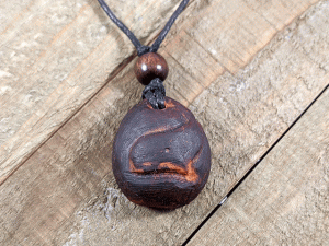 Hand-Carved Avocado Stone Necklace With Whale