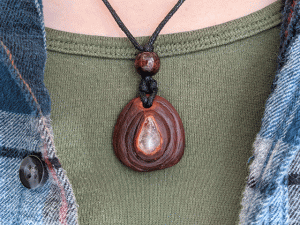 hand-carved avocado necklace with clear quartz