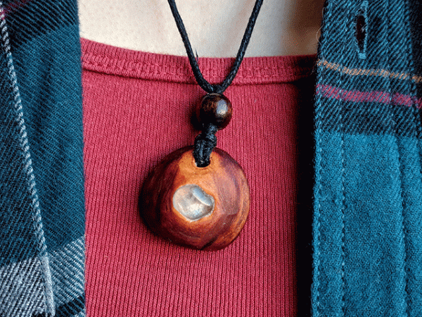 Hand-carved avocado necklace with clear quartz