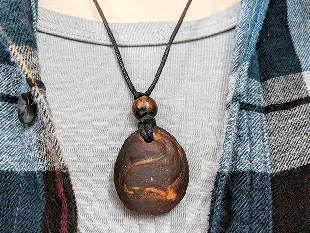 Hand-Carved Avocado Stone Necklace With Whale