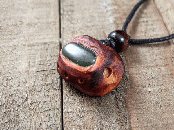 hand-carved avocado stone necklace with aventurine gemstone