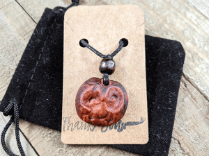 hand-carved avocado stone owl totem necklace