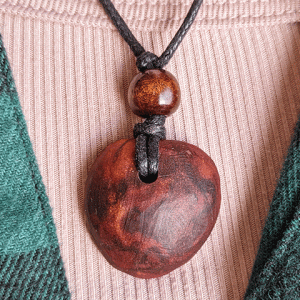 hand-carved avocado stone necklace with natural design