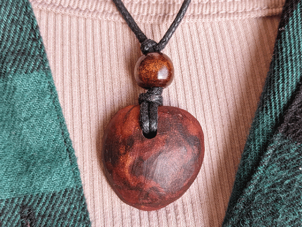 hand-carved avocado stone necklace with natural design