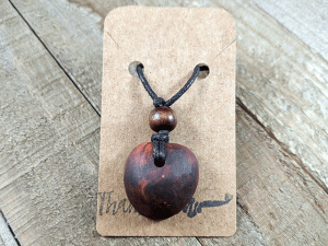 hand-carved avocado stone necklace with natural design