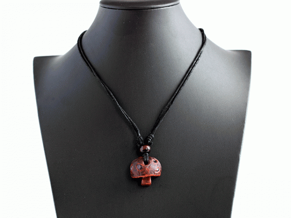 hand-carved avocado stone mushroom necklace with amethysts