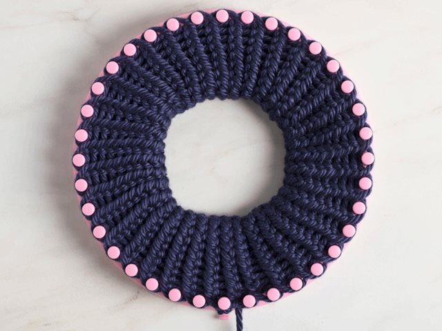 how to loom knit a tiny hearts beanie - fold up the brim