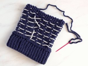 how to loom knit a tiny hearts beanie - take the beanie off the loom
