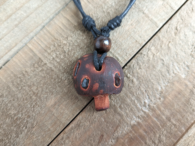 Poison mushroom necklace with red garnets